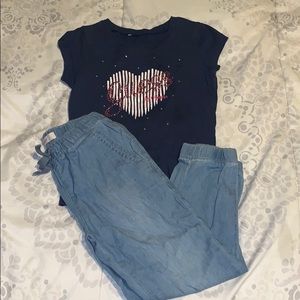 Levis joggers and Guess shirt